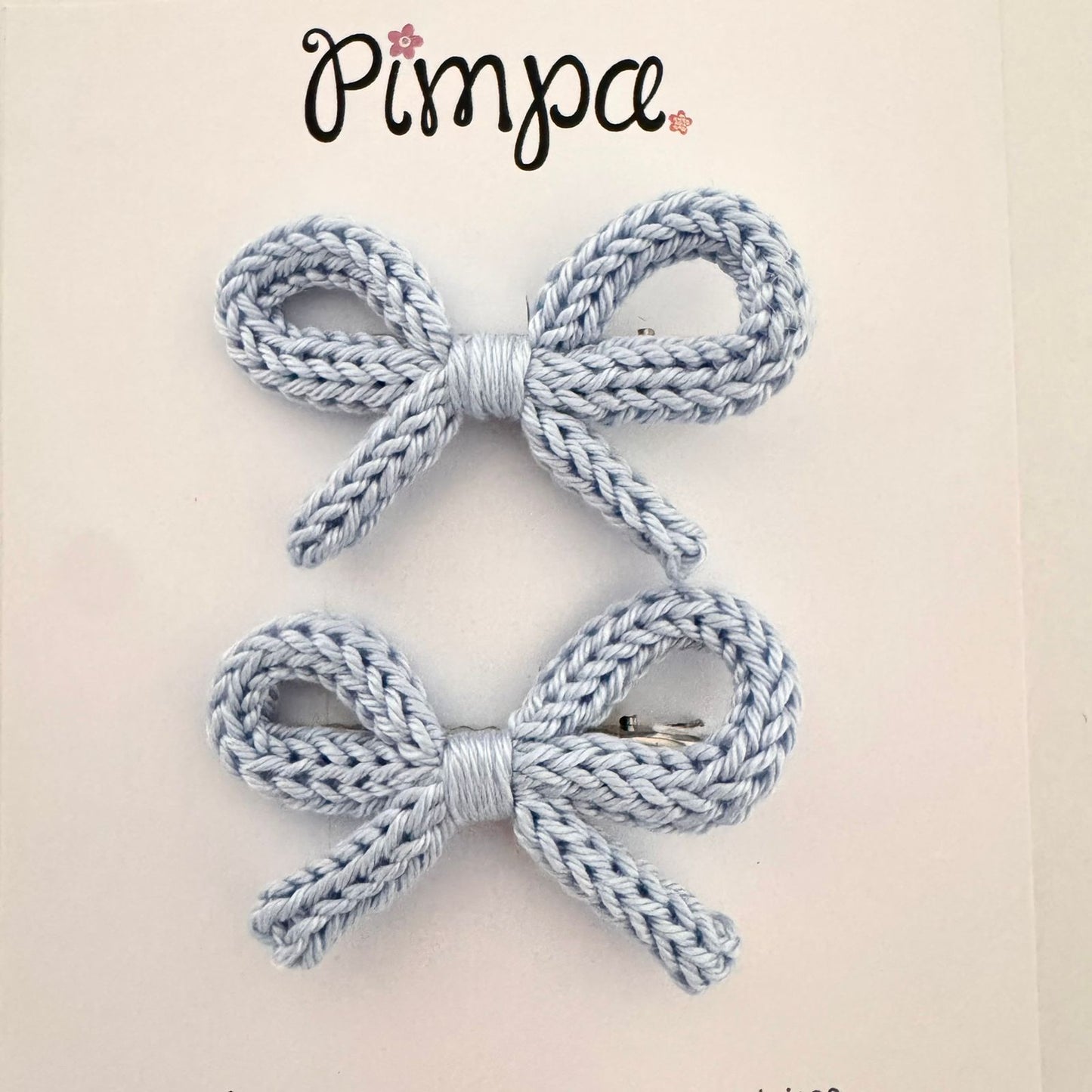 Micaela - par de moñitos tejidos en pinza